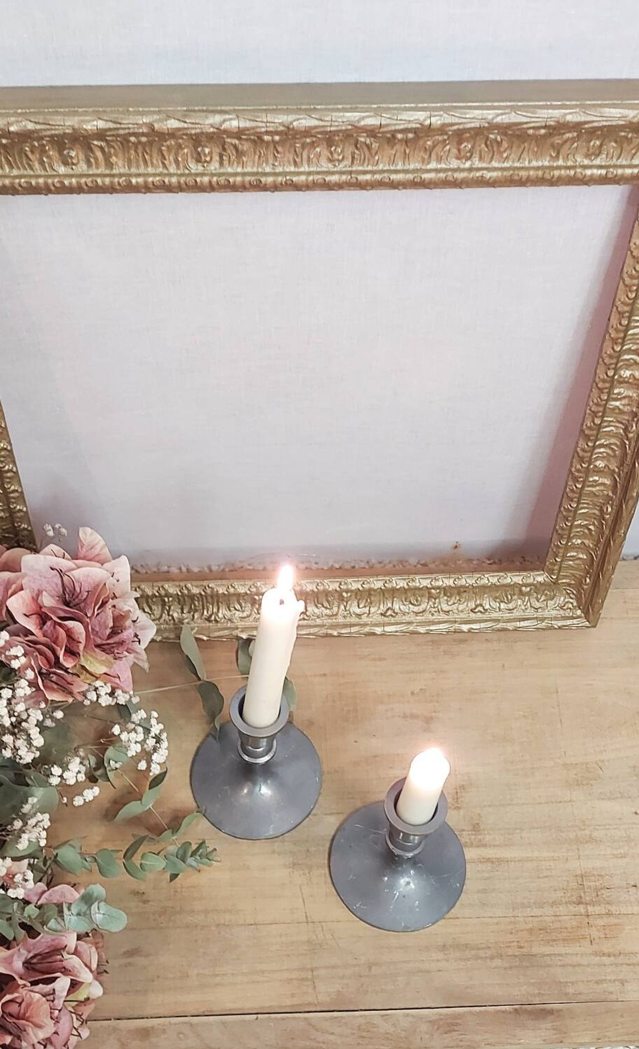 Pair of pewter candle holders