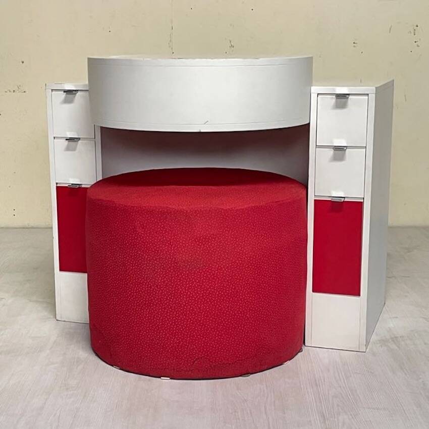 Bathroom toilet with a 70s pouf.