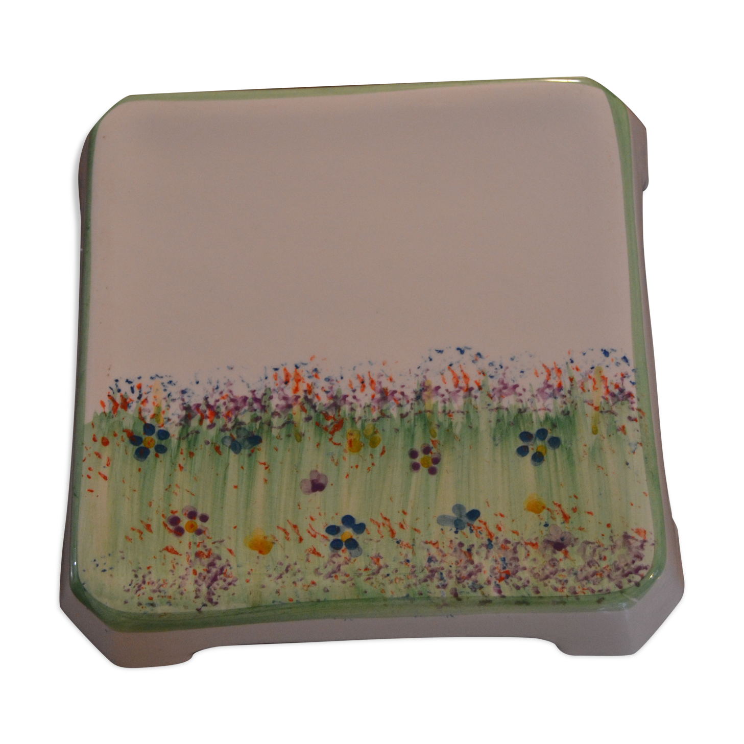 Underside of flat small flowers painted by hand