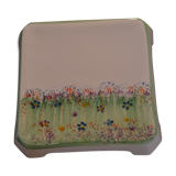 Underside of flat small flowers painted by hand