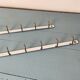 Two chrome tea towel hooks