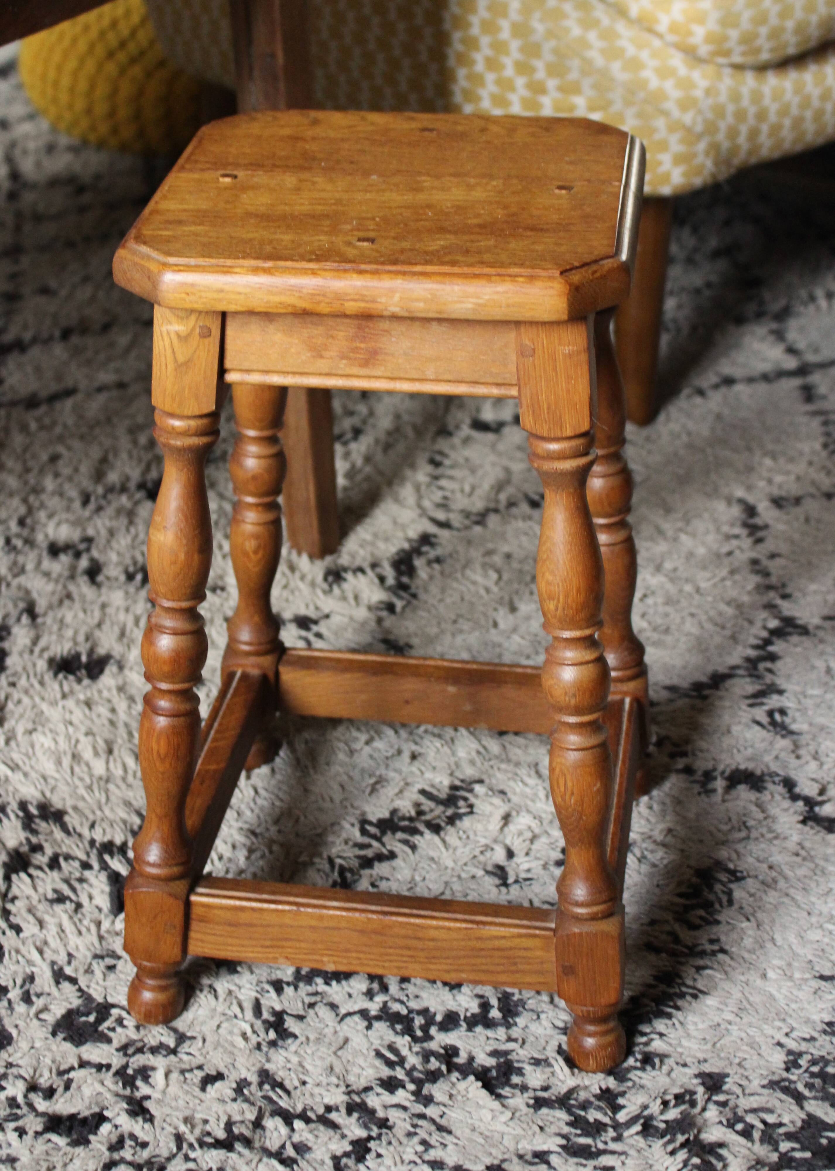 Wooden stool with a square seat