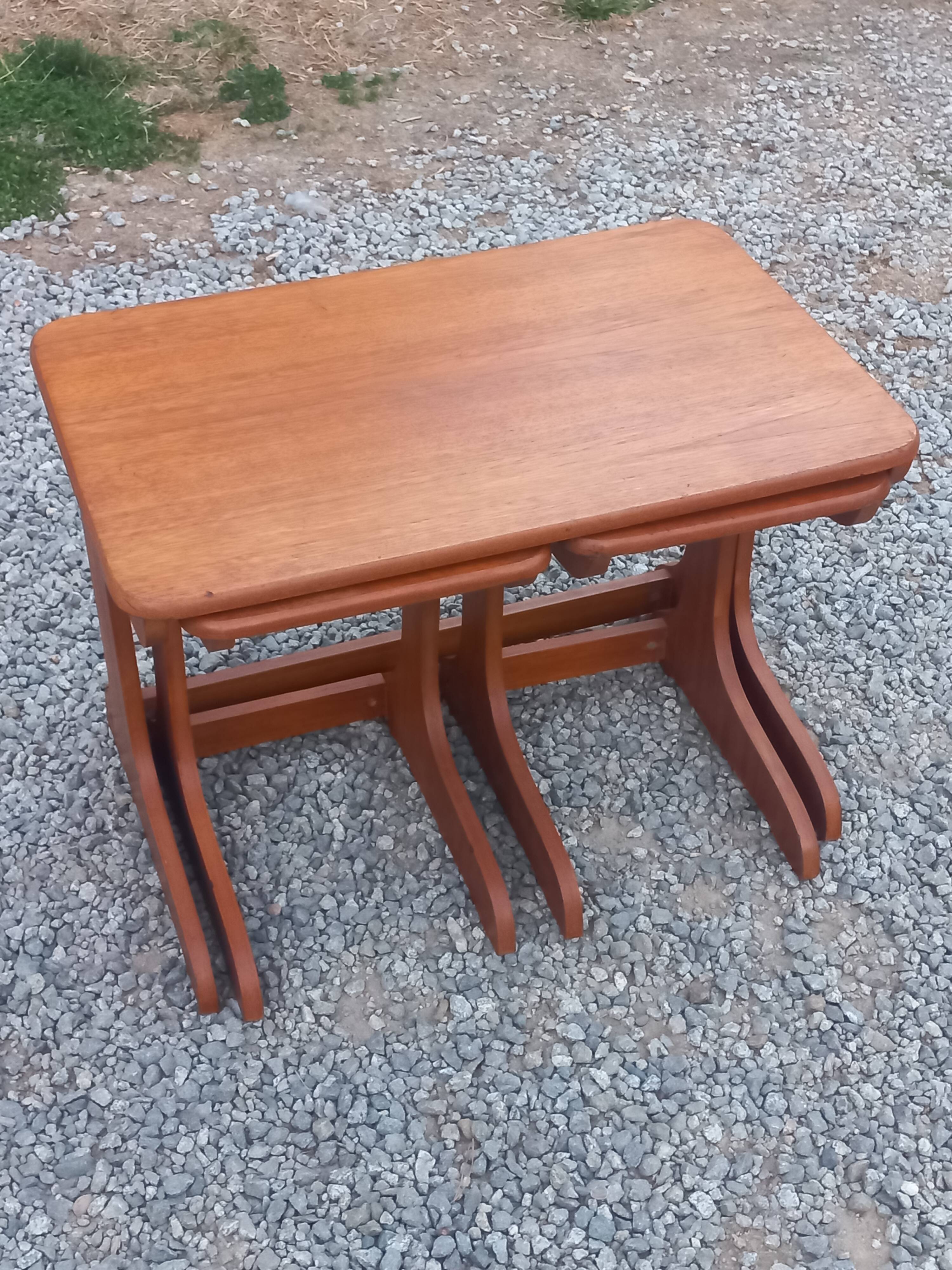 Set of 3 nesting tables in Scandinavian style made of teak from the 1970s.