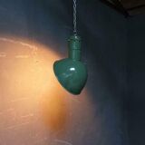 Old industrial enamel lamp in green