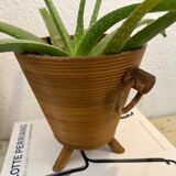 Cache-pot vintage en rotin