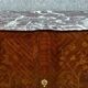 Wooden cabinet with doors, richly inlaid with floral patterns, Louis XV style.