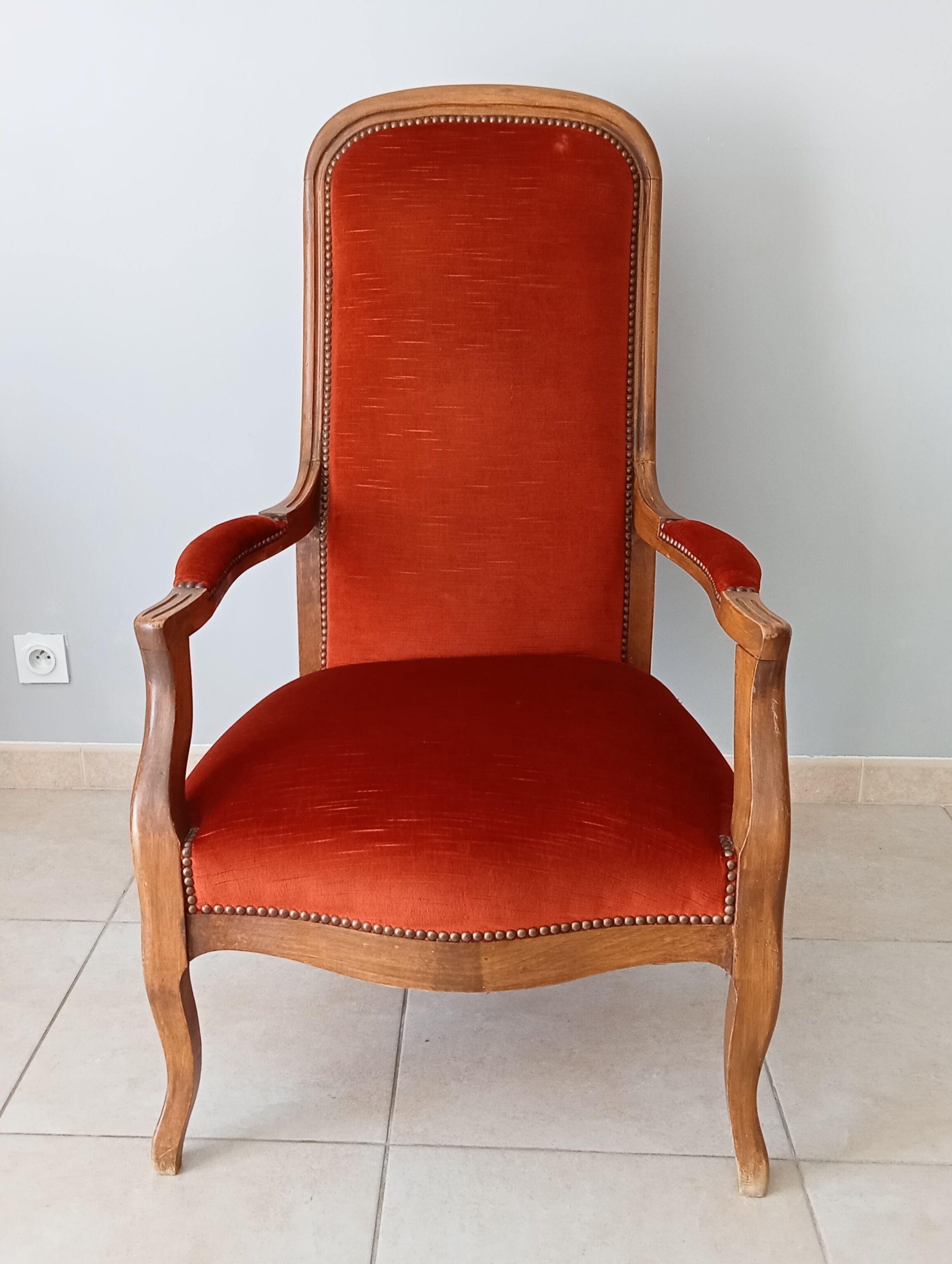 Walnut and velvet voltaire armchair