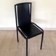 4 postmodern design chairs in black metal and leather, 1980's
