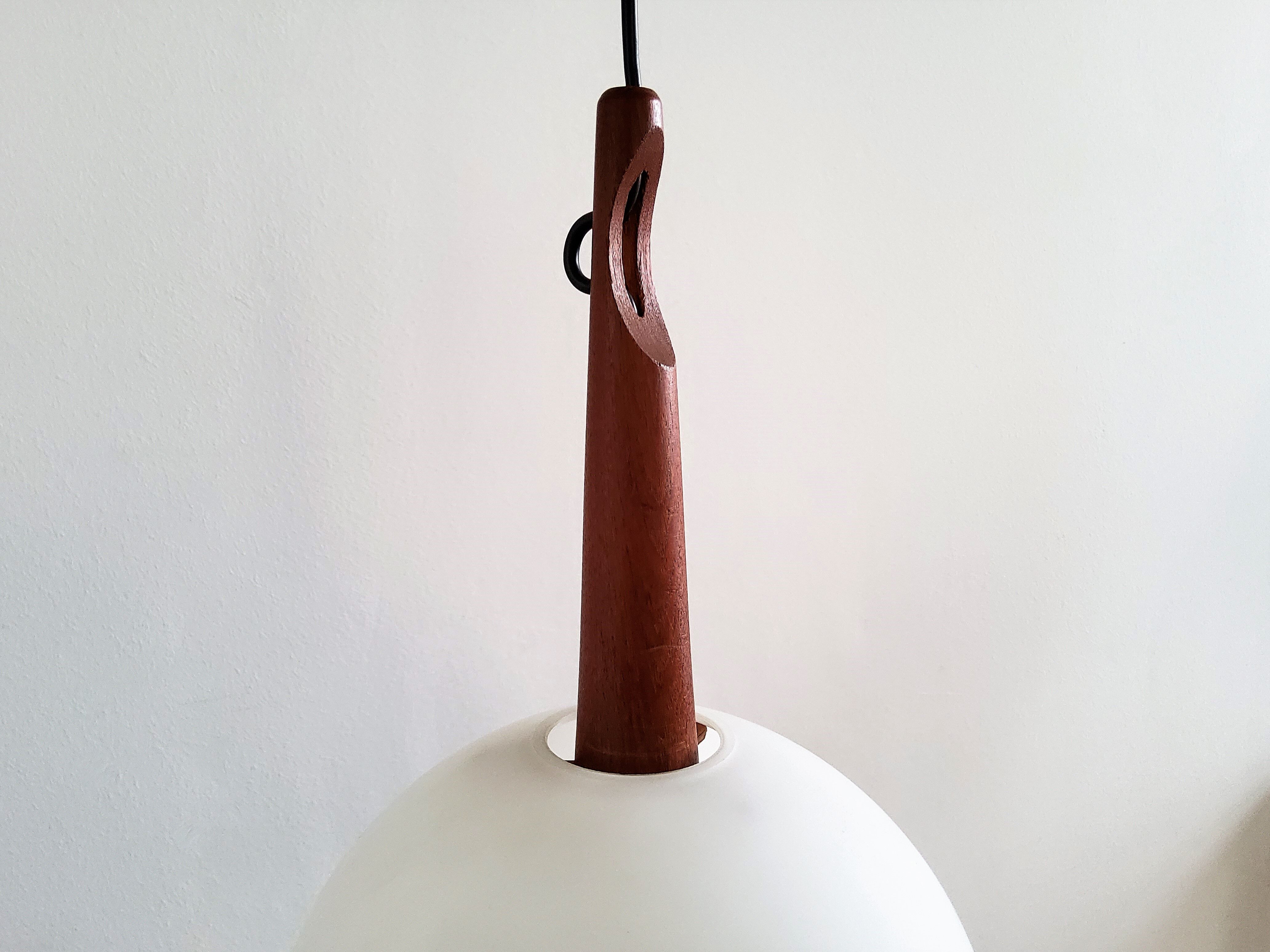 Teak and opaline glass pendant lamp by Uno and Östen Kristiansson for Luxus, Sweden 1950's