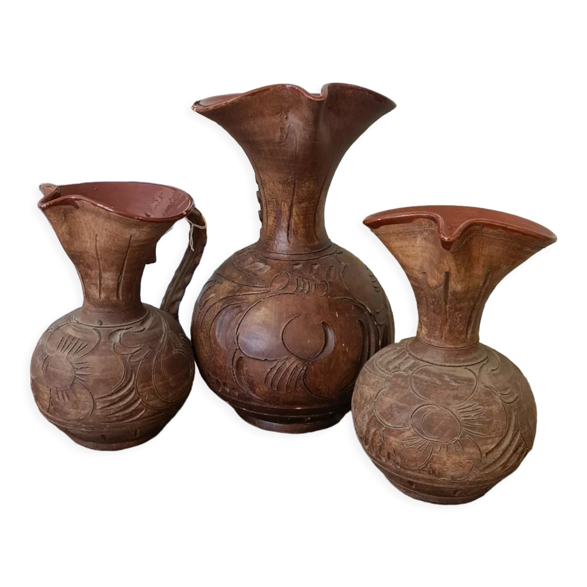 Set of carved terracotta pitchers
