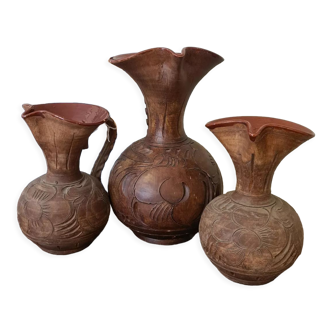Set of carved terracotta pitchers