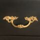 Louis XV style curved black matte commode with gilded bronze ornamentation from the 1950s.