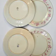 4 flat plates in fine Limoges porcelain from the Raynaud house.