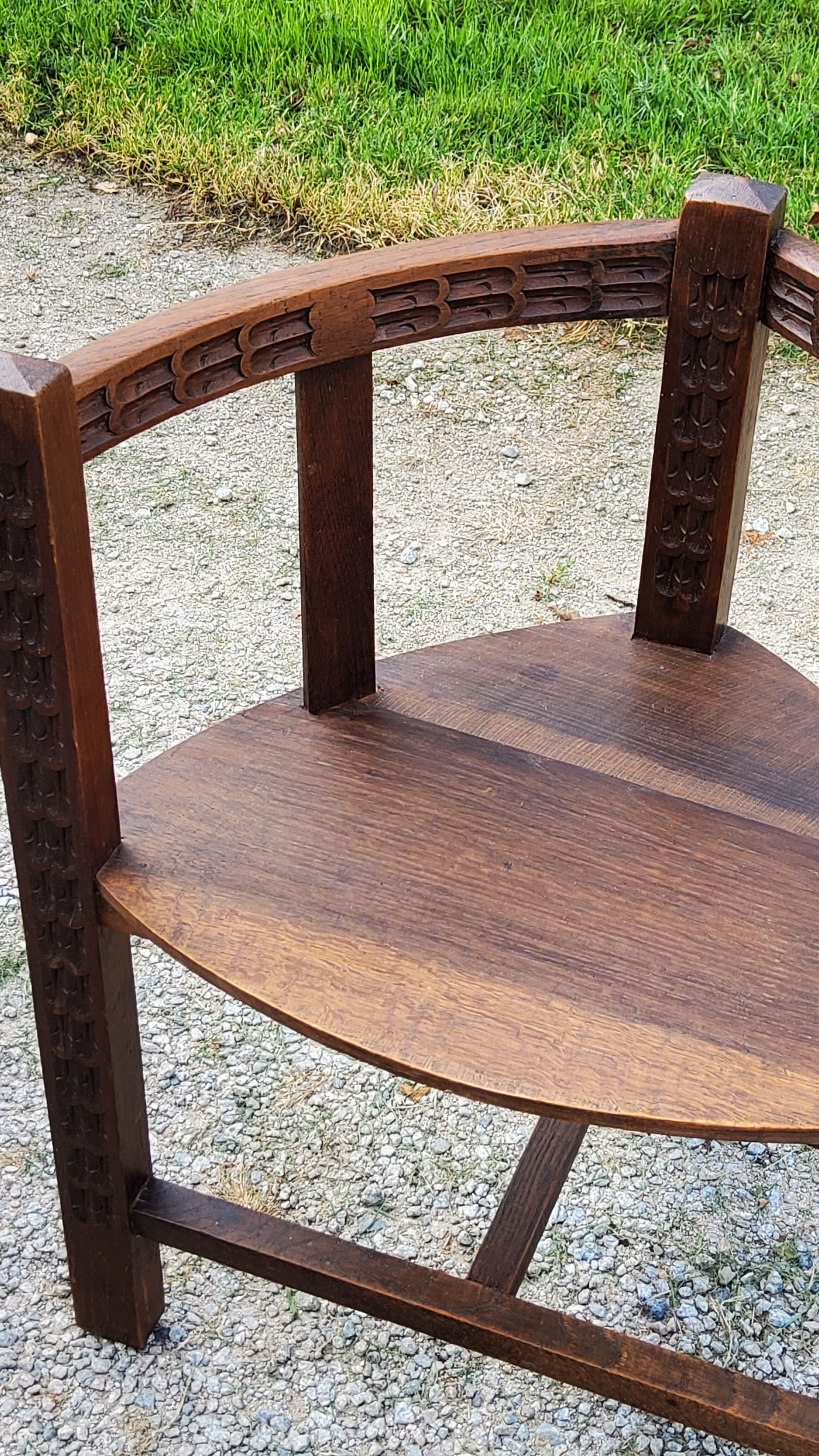 Set of three brutalist tripod armchairs in carved solid oak
