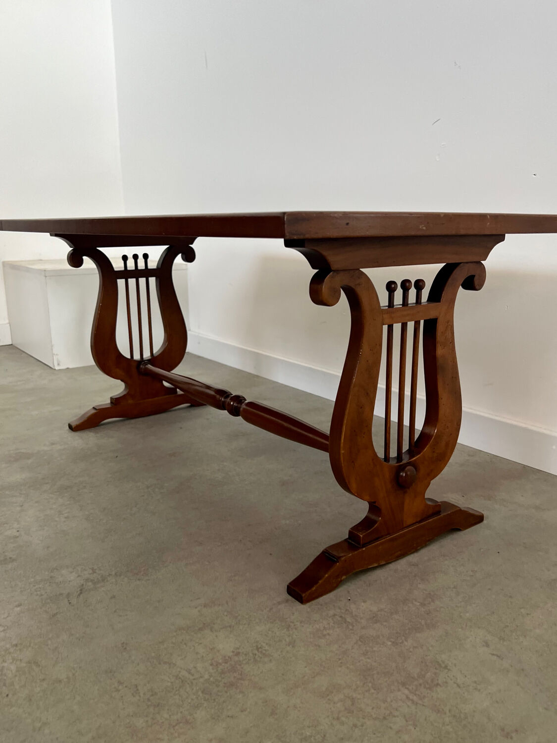 Old rectangular wood coffee table with lyre side posts