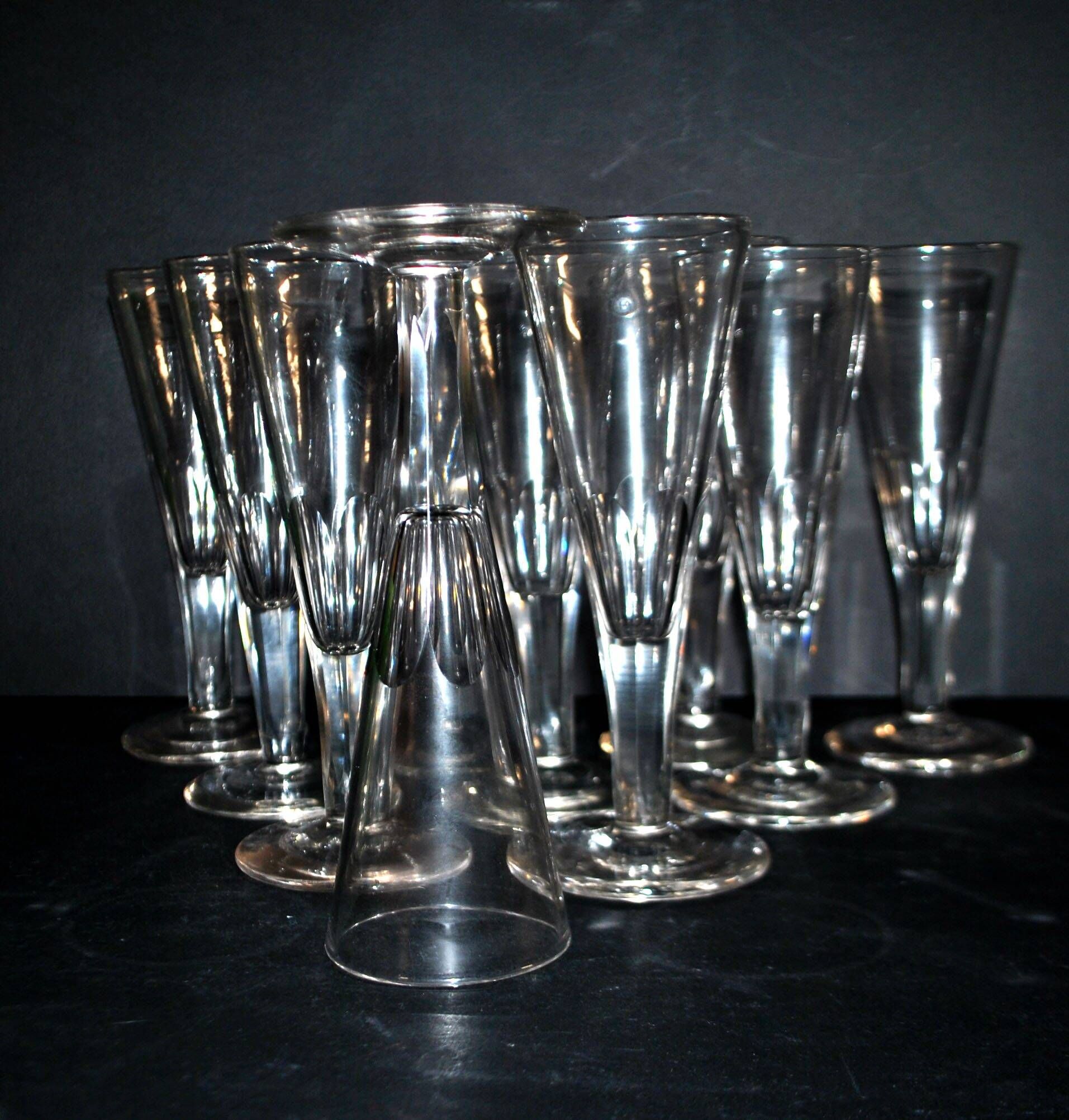 Portieux? Meisenthal? Set of 10 cut glass champagne flutes with flat sides from 1900.