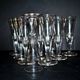 Portieux? Meisenthal? Set of 10 cut glass champagne flutes with flat sides from 1900.