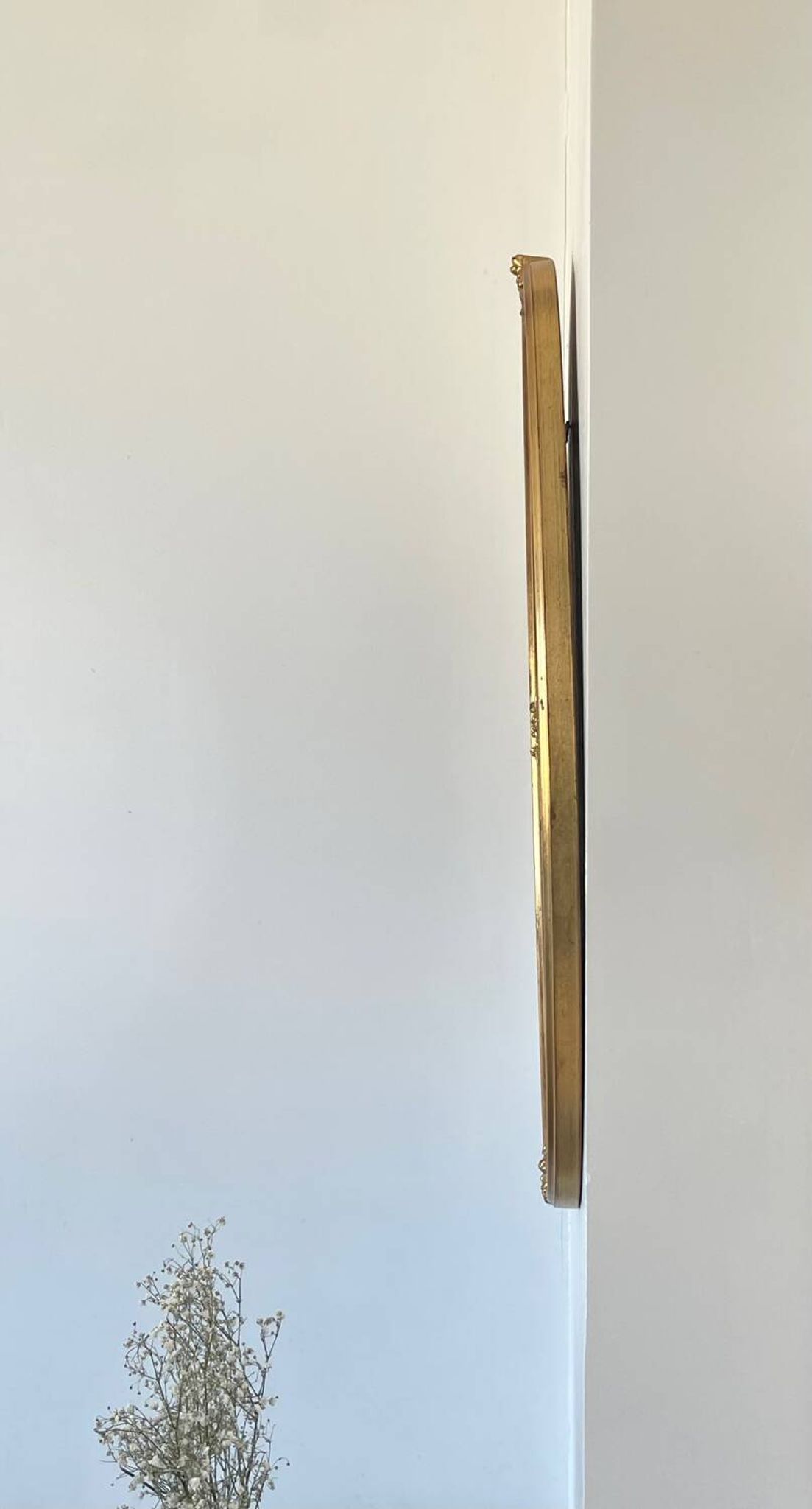 Oval mirror in carved wood