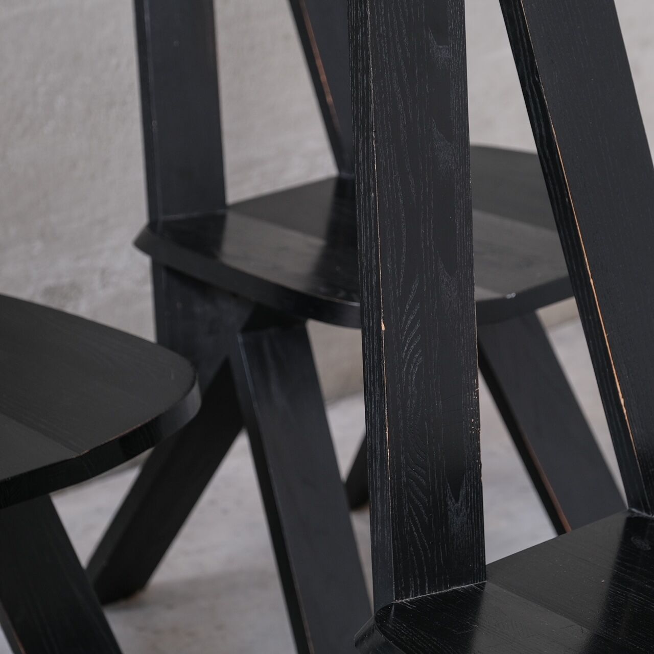 Set of six black dining chairs