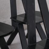 Set of six black dining chairs