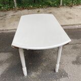 Louis Philippe round dining table with folding shutters repainted in beige grey