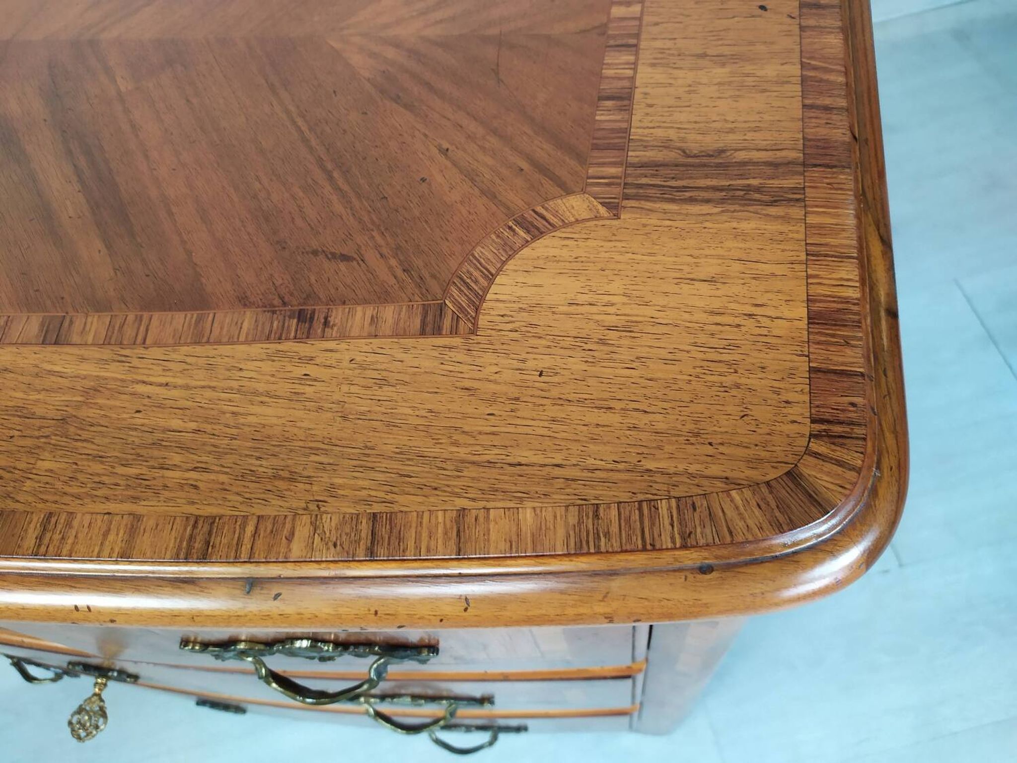 Marquetry style chest of drawers
