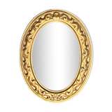 Small vintage wall mirror in gold resin
