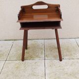 Vintage bedside table with compass legs