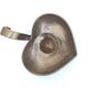 Heart-shaped brass candle holder