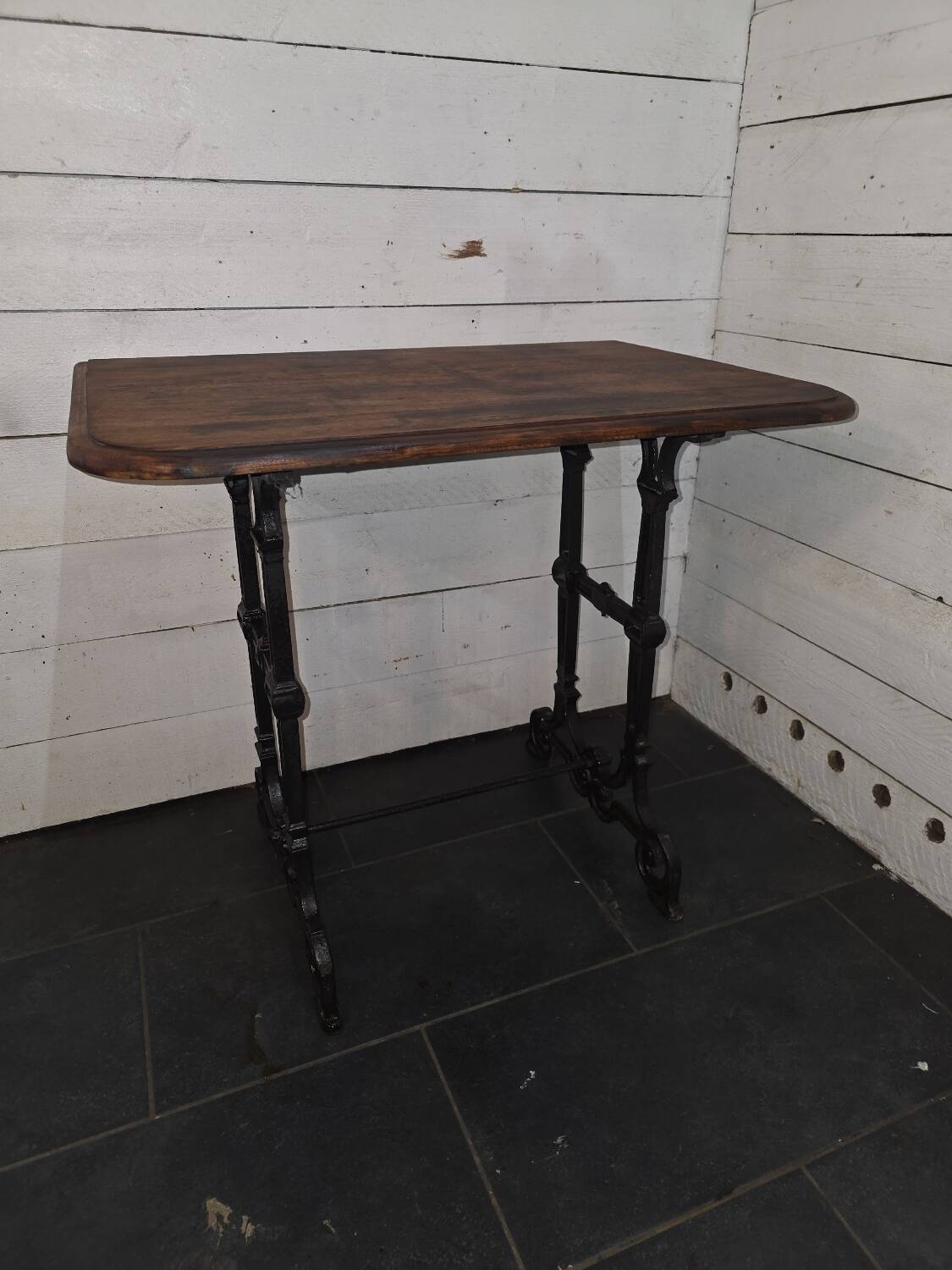Bistro table with cast iron legs and oak top