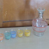 Service a Liqueur consisting of a metal servant, a carafe and 6 small vintage glasses 1950