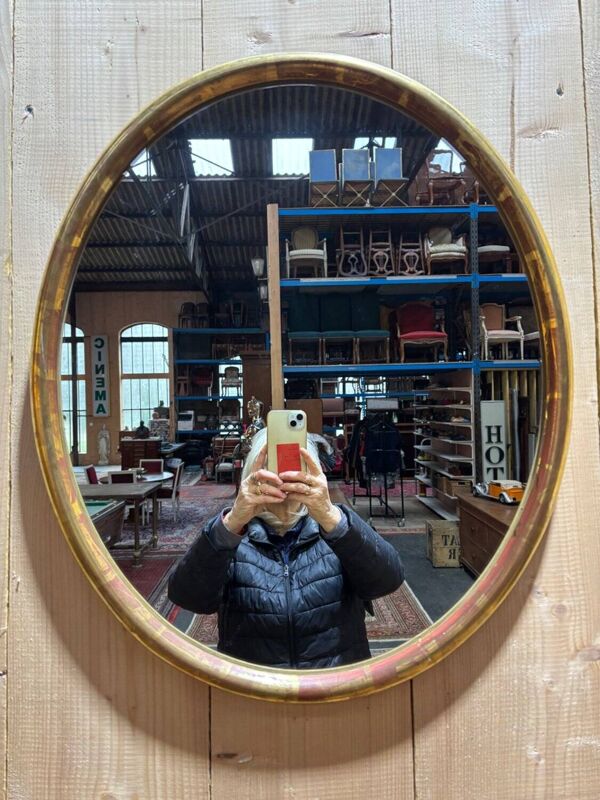 Miroir ovale de style Louis XVI