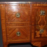 Louis XVI style chest of drawers with music attributes