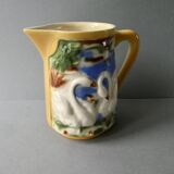 Poet Laval slip pitcher with bird and swan decor