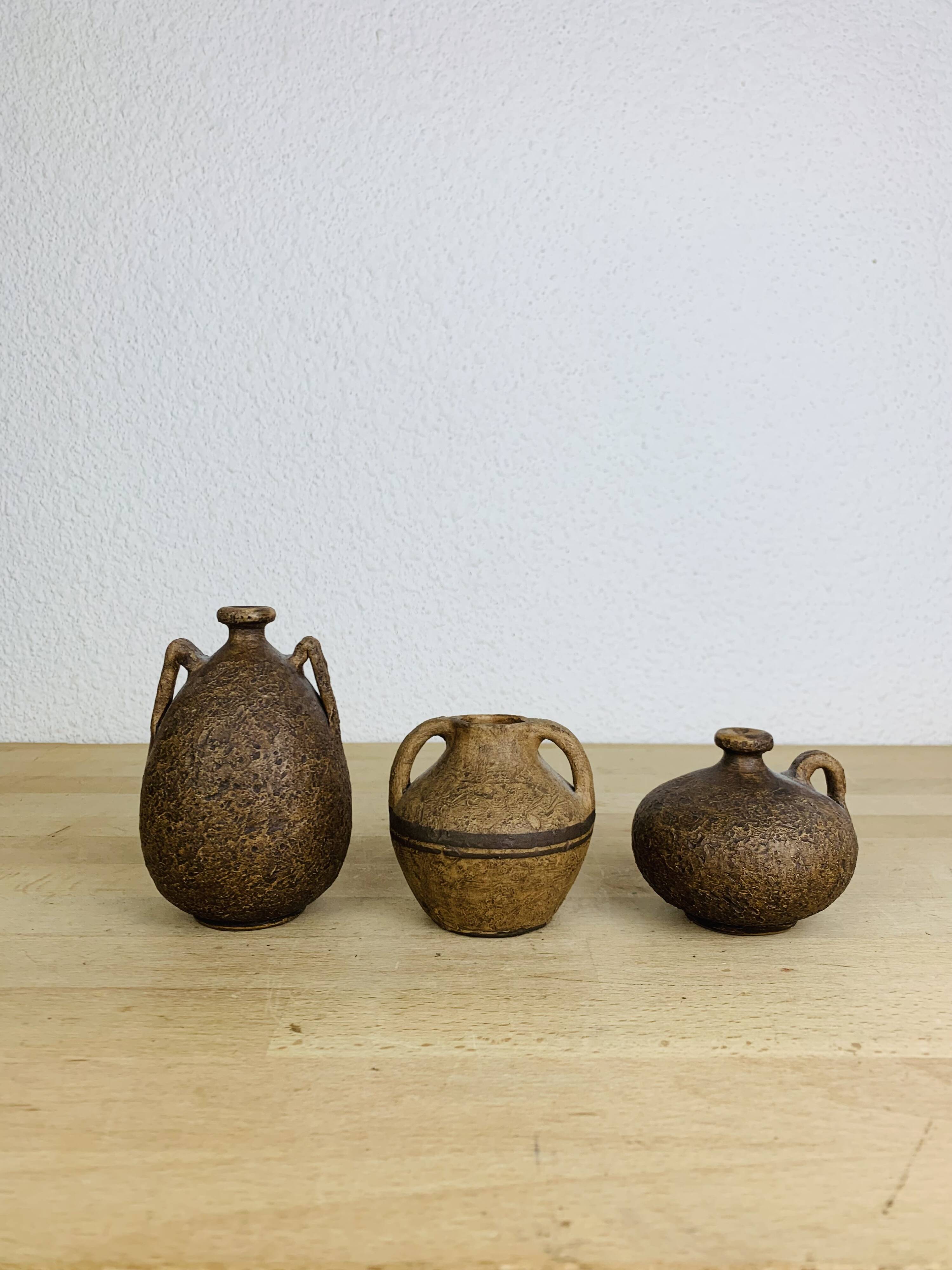 Trio of vintage stoneware vases