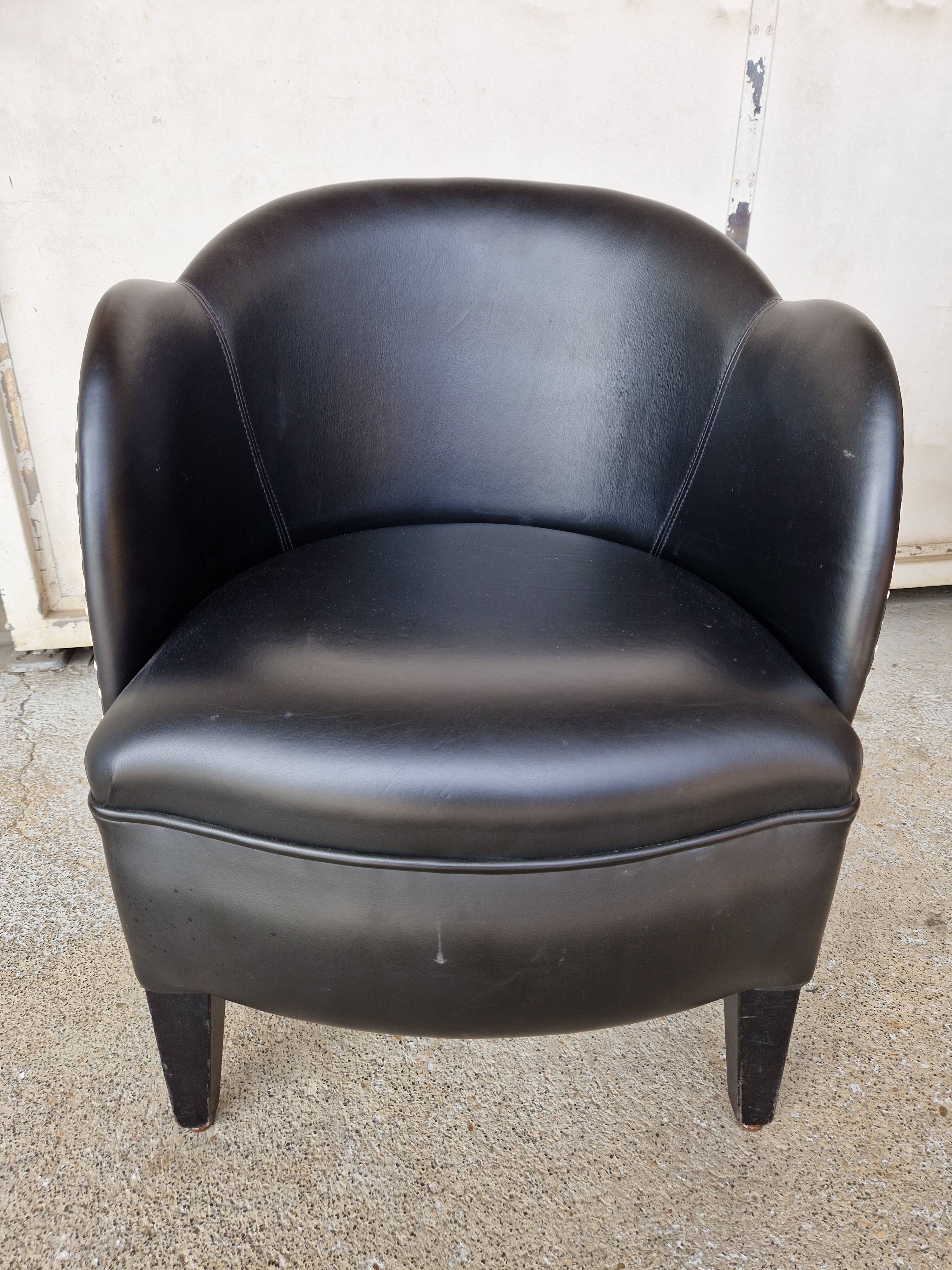 Pair of armchairs in imitation leather