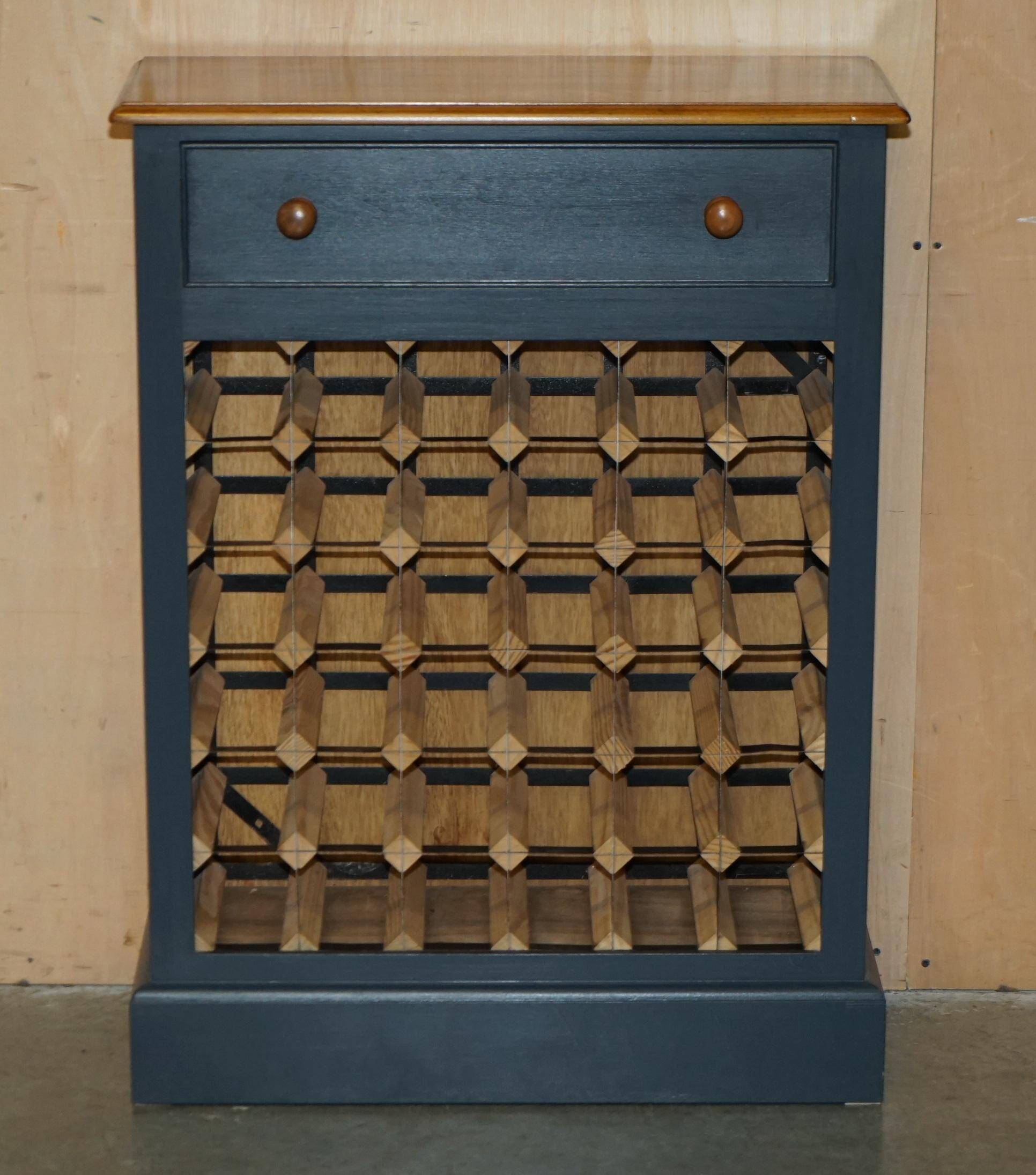 Vintage wine rack furniture for 36 bottles with drawer.
