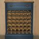 Vintage wine rack furniture for 36 bottles with drawer.