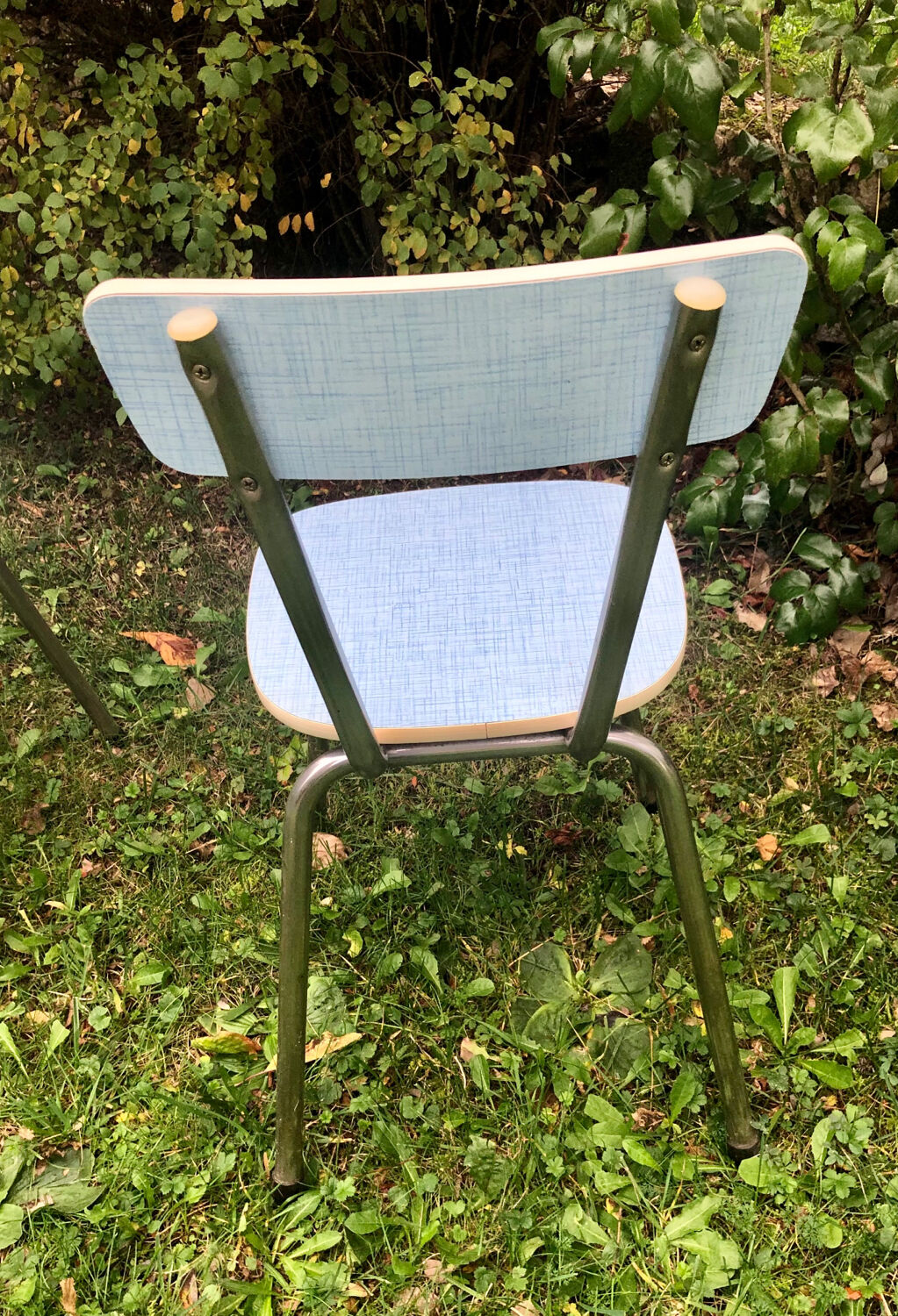 2 blue formica chairs