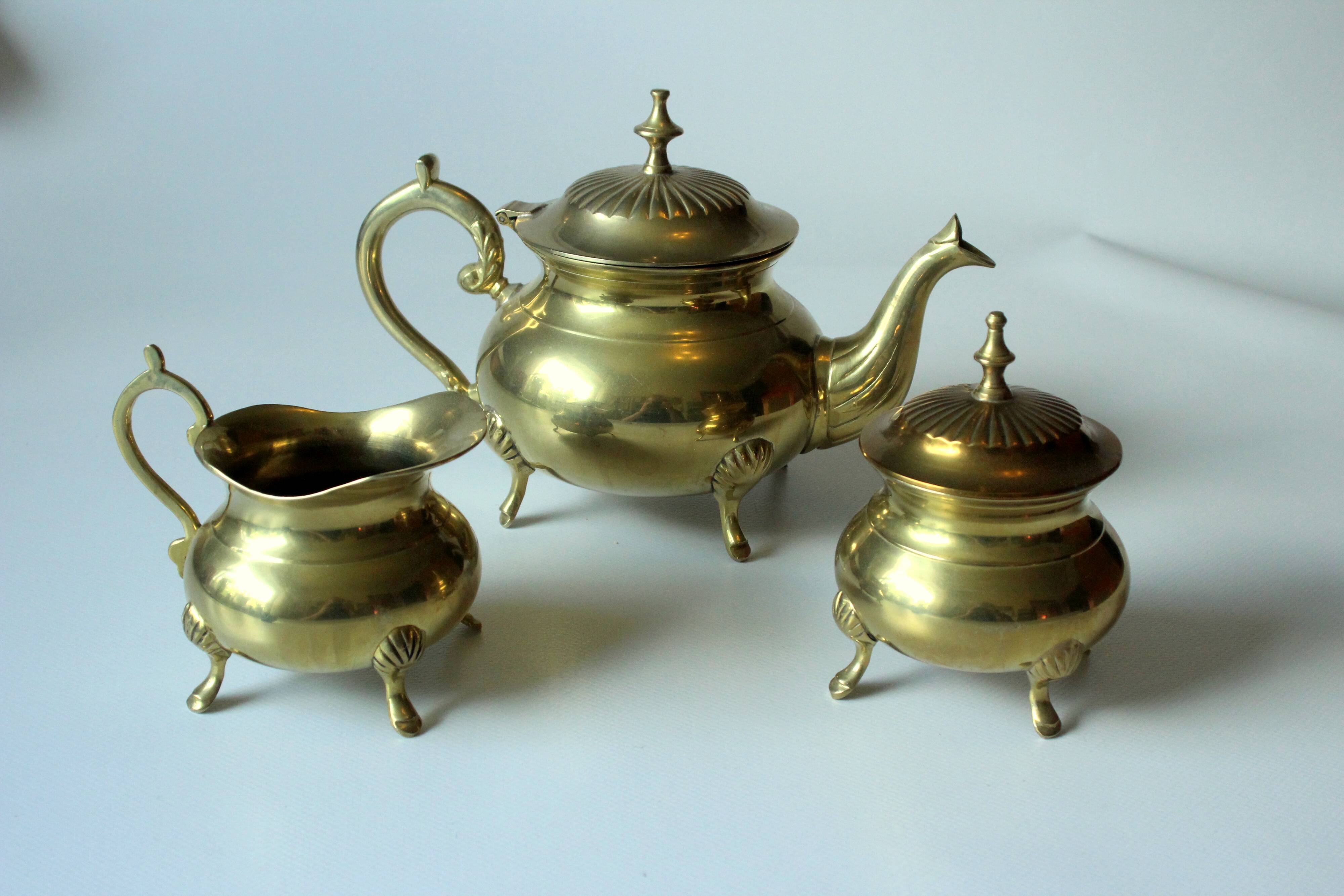 Metal teapot gold plated, inside silver plated, with milk pot and sugar bowl as a set, vintage