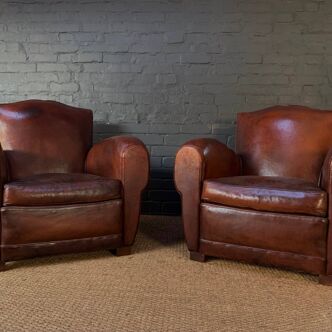 A Stunning Pair of French Leather Club Chairs, Havana Mustache Models c 1930 with Cuban cigar arms