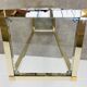 Gilded metal fifth wheel column and Hollywood Regency style glass 70s