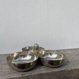Silver-plated metal dish topped with an acorn