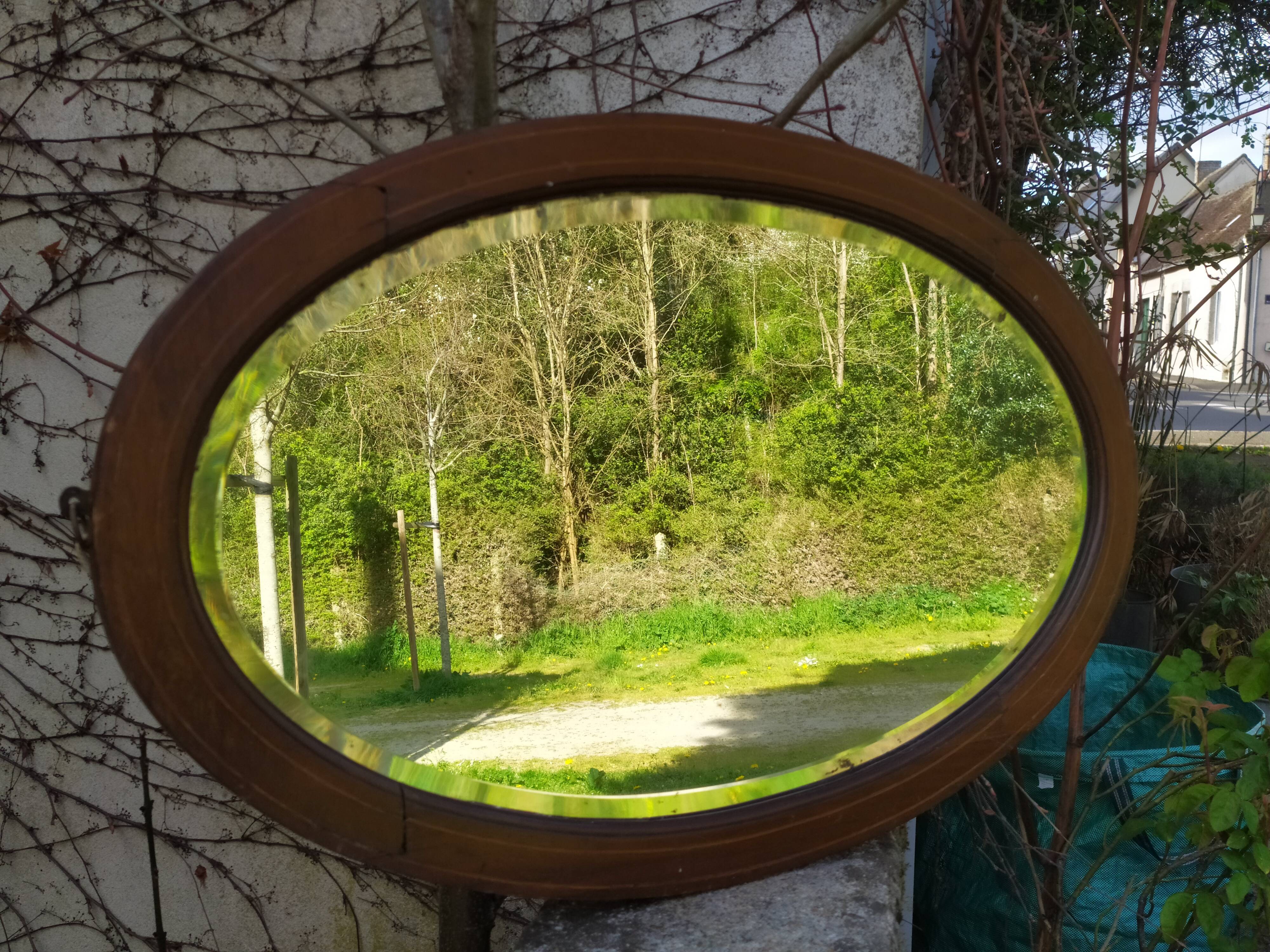 Beveled oval mirror 83x52cm