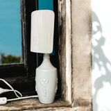 White ceramic table lamp with half lampshade