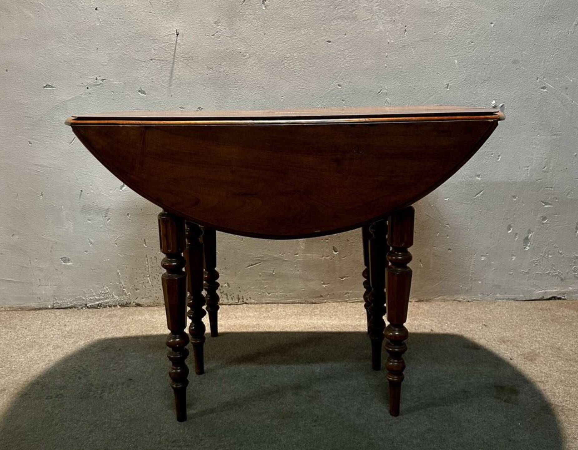 National walnut slatted table, Italy, late 19th century