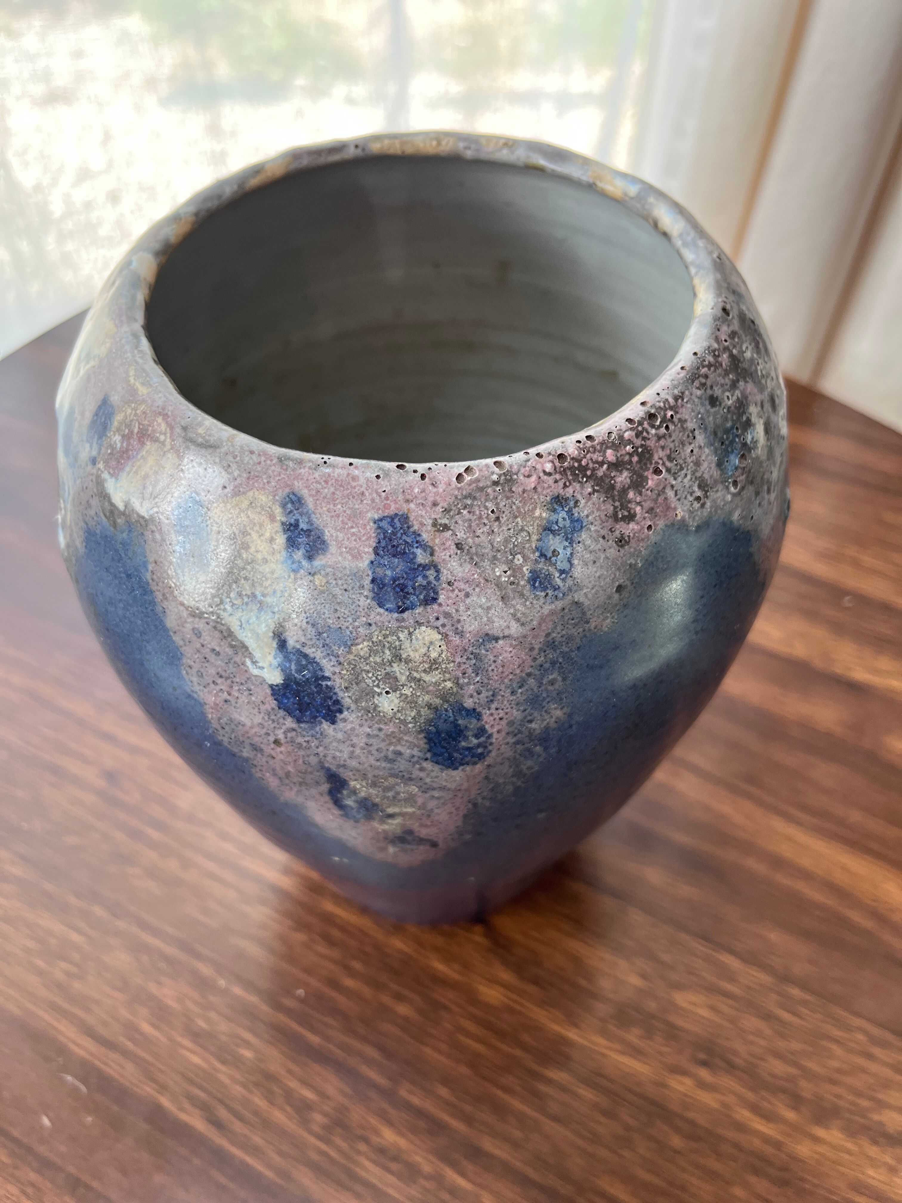 Blue vase with inclusion