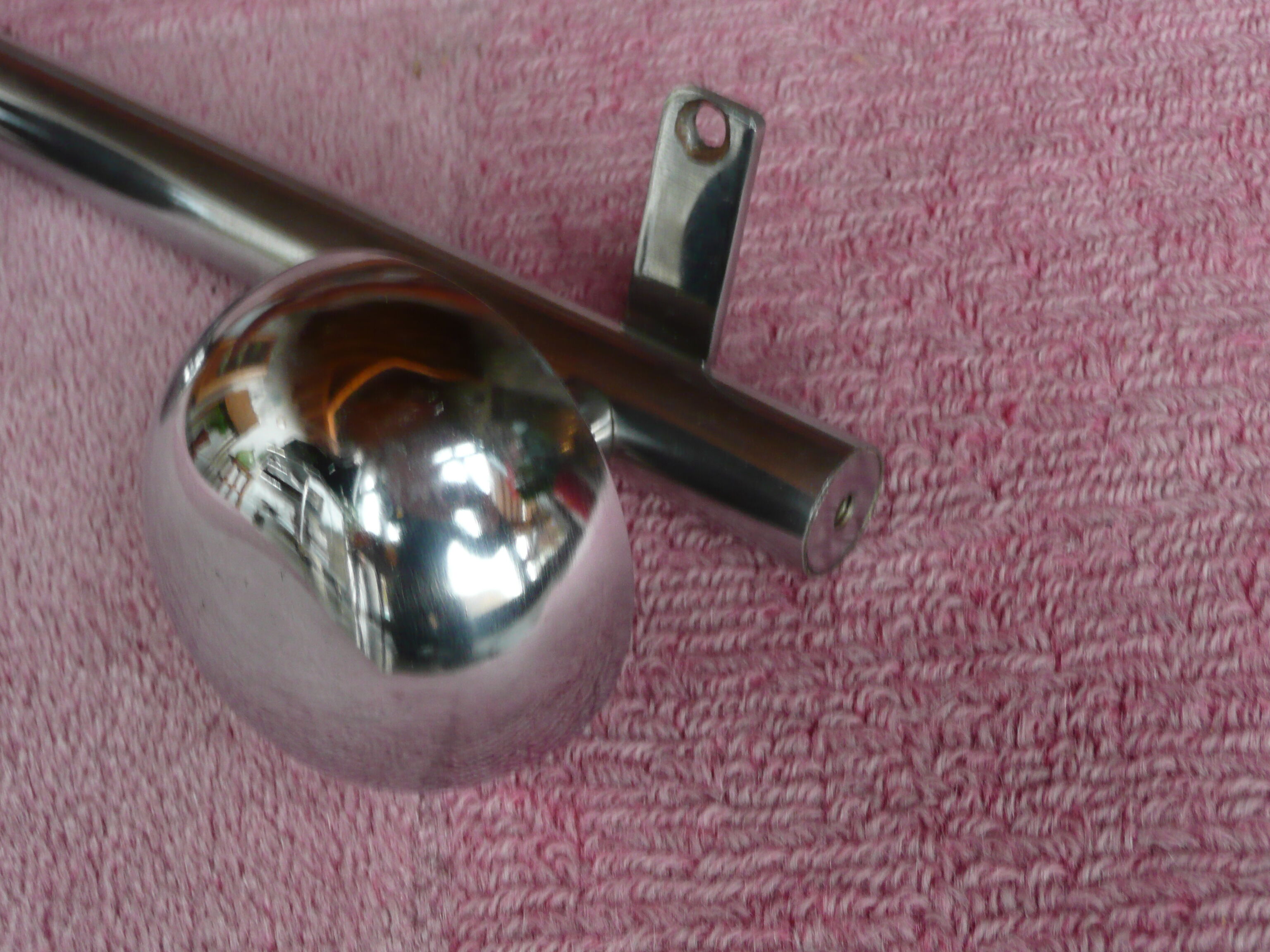 Vintage chrome coat holder