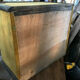 Old wooden chest and yellow velvet