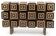A low Art Deco buffet in two-tone relief marquetry.